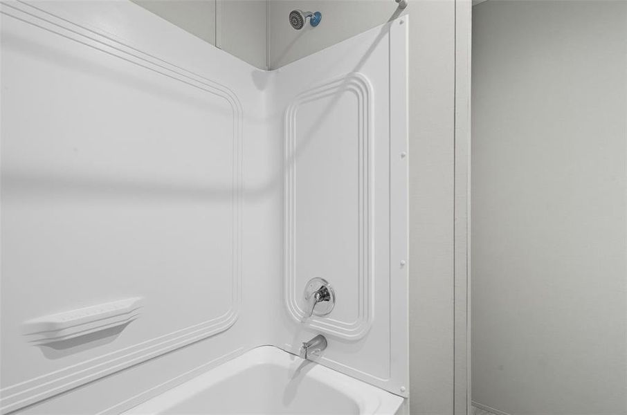 Bathroom view of shower / bathtub combination Bathroom view of shower / bathtub combination