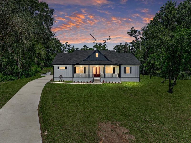 Front exterior of a new home in , Dade City, FL, highlighting curb appeal (Image 27). Front exterior of a new home in , Dade City, FL, highlighting curb appeal (Image 27).