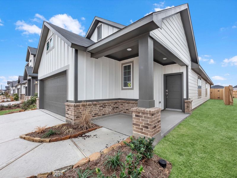 Exterior details and patio area of a home in Mason Woods, Cypress (Image 3). Exterior details and patio area of a home in Mason Woods, Cypress (Image 3).