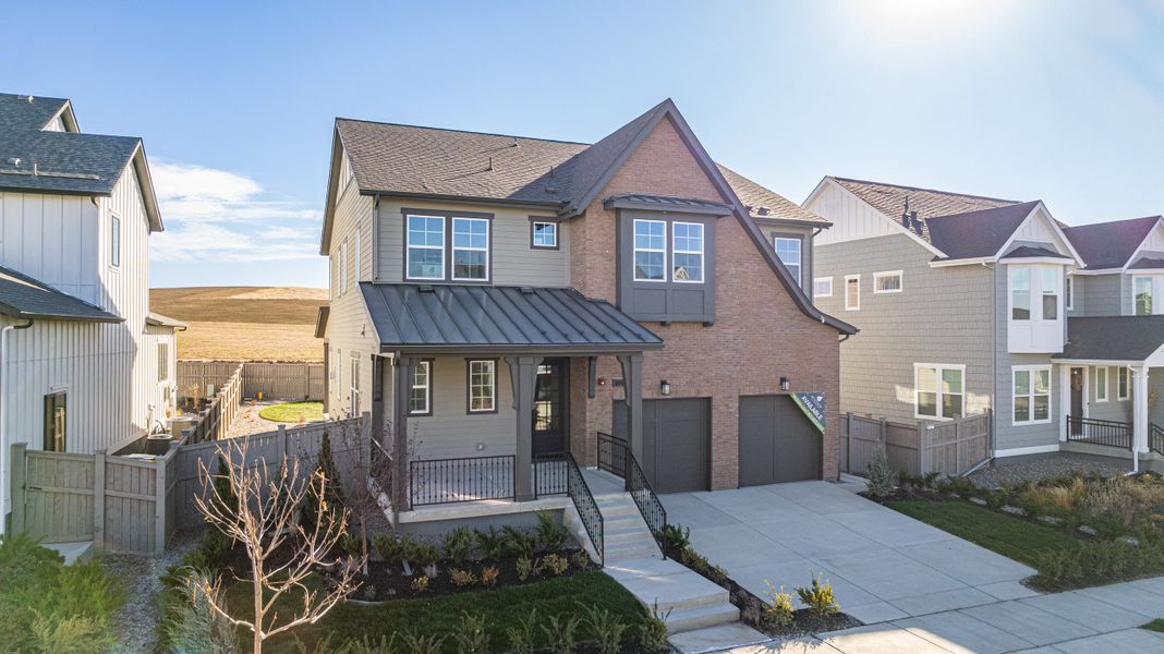 Front exterior of a new home in Westerly, Erie, CO, highlighting curb appeal (Image 26). Front exterior of a new home in Westerly, Erie, CO, highlighting curb appeal (Image 26).