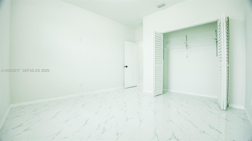 Spacious, unfurnished interior of a new home in , Lehigh Acres (Image 7).