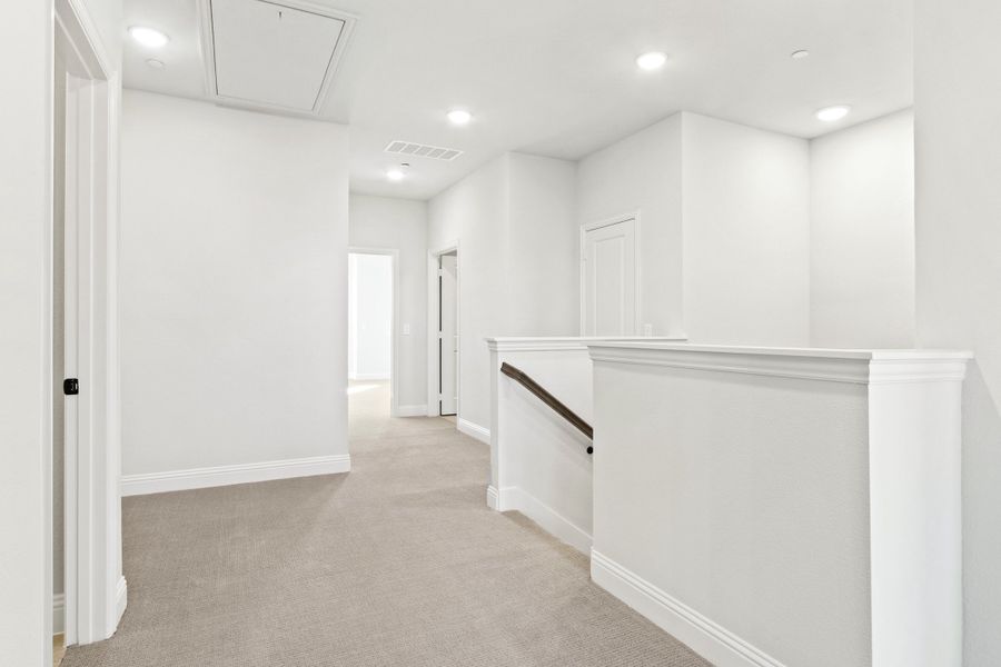 Spacious, unfurnished interior of a new home in The Tribute, The Colony (Image 24).