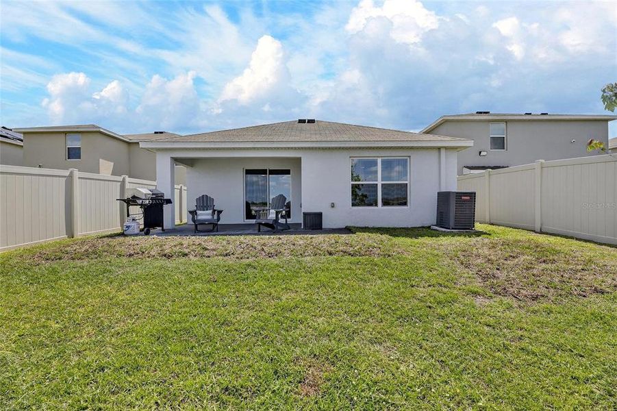 Exterior details and patio area of a home in Berry Bay, Wimauma (Image 23).