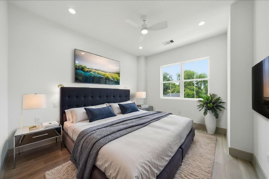 Virtually staged - Primary bedroom with tall 11' ceilings (and 11' throughout the home!). NO CARPET in this home!