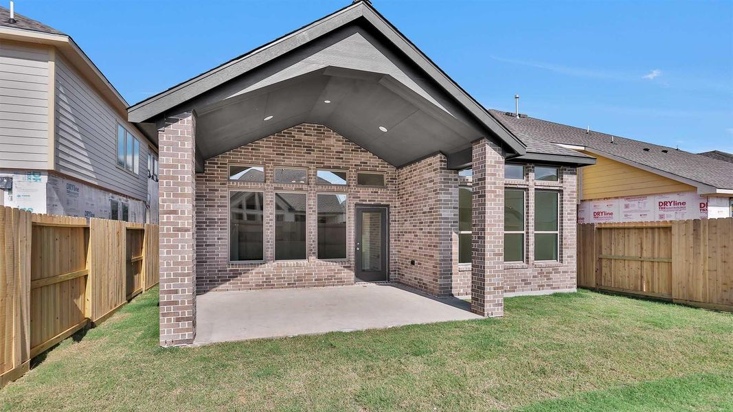 Front exterior of a new home in Candela 40', Richmond, TX, highlighting curb appeal (Image 1). Front exterior of a new home in Candela 40', Richmond, TX, highlighting curb appeal (Image 1).