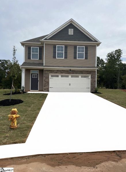 Front exterior of a new home in Sedona, Greenville, SC, highlighting curb appeal (Image 2).