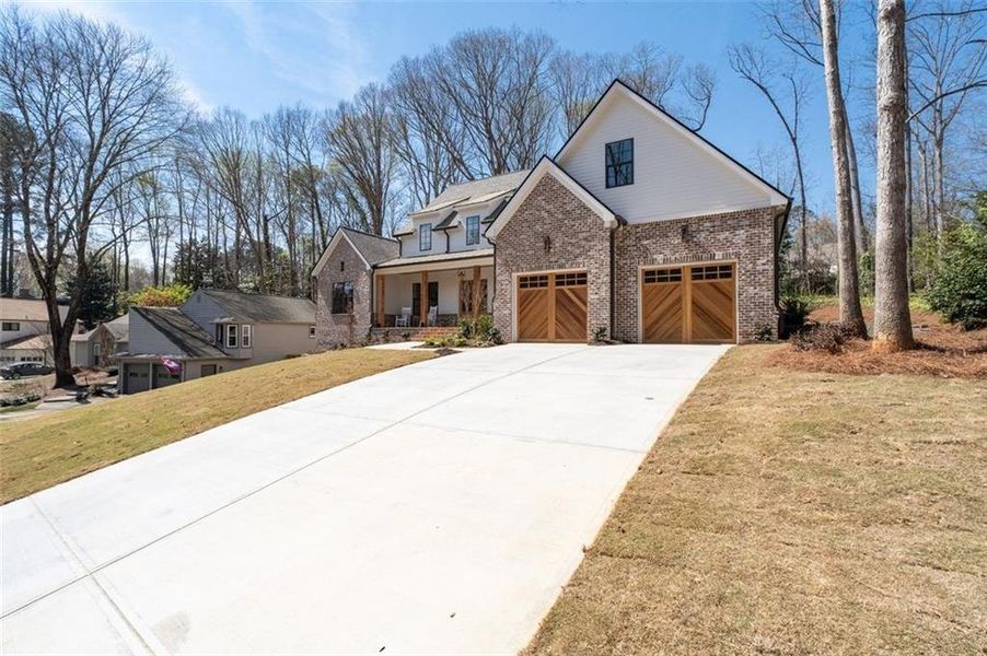 Front exterior of a new home in , Marietta, GA, highlighting curb appeal (Image 28).