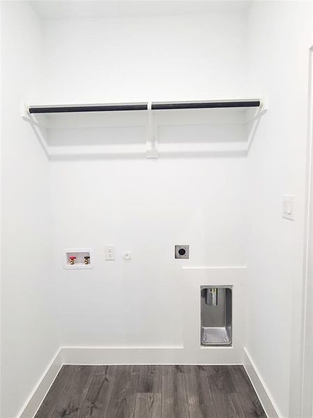 Laundry room with hookup for a gas dryer, electric dryer hookup, hookup for a washing machine, and dark wood-style flooring Laundry room with hookup for a gas dryer, electric dryer hookup, hookup for a washing machine, and dark wood-style flooring
