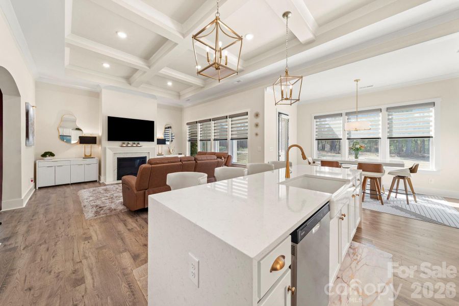 Open Concept of Kitchen, Dining and Great Room with Extended Coffered Ceiling