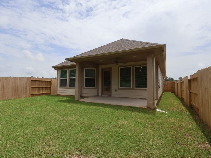 Exterior details and patio area of a home in Lone Star Landing, Montgomery (Image 4). Exterior details and patio area of a home in Lone Star Landing, Montgomery (Image 4).