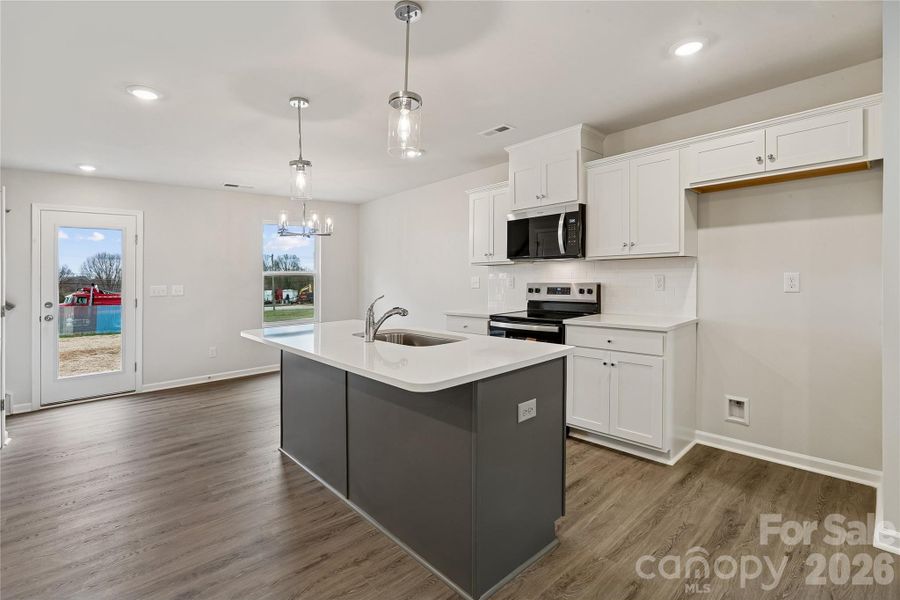 Furnished interior view inside a new home in , Statesville (Image 9).