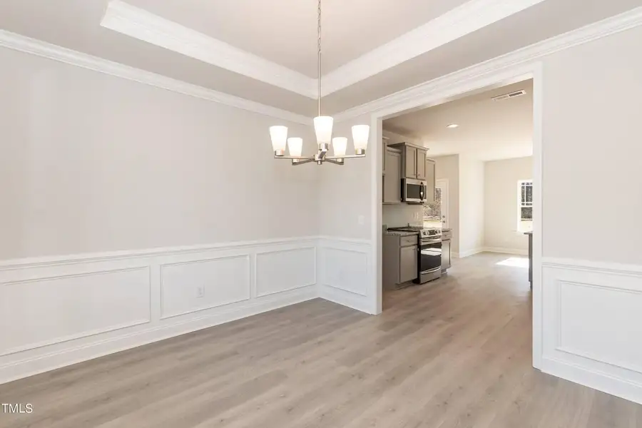 Representative unfurnished interior of a home built from the 2721 by Adams Homes in Hidden Pines, Cameron (Image 12).