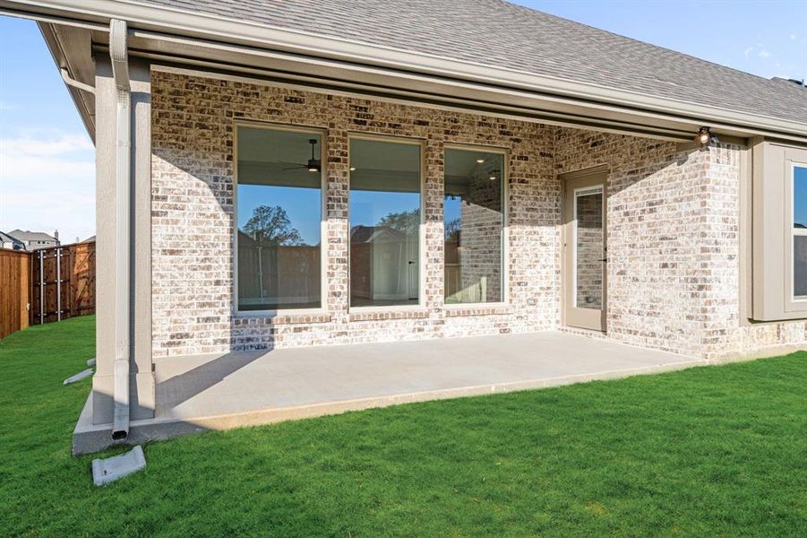 Exterior details and patio area of a home in Mockingbird Hills 60-65, Joshua (Image 4).