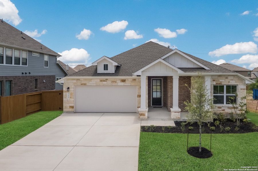 Front exterior of a new home in Foxbrook, Cibolo, TX, highlighting curb appeal (Image 24).