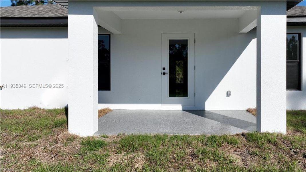 Exterior details and patio area of a home in , Lehigh Acres (Image 4).