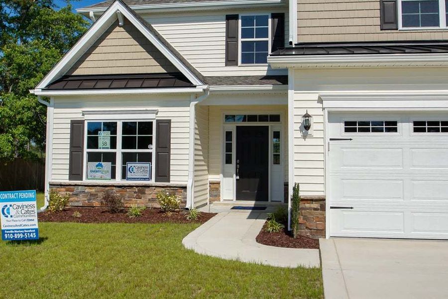 Representative exterior photo of a completed home built from the Aberdeen by Caviness & Cates Communities in Bartlett Manor, Youngsville, NC (Image 14).