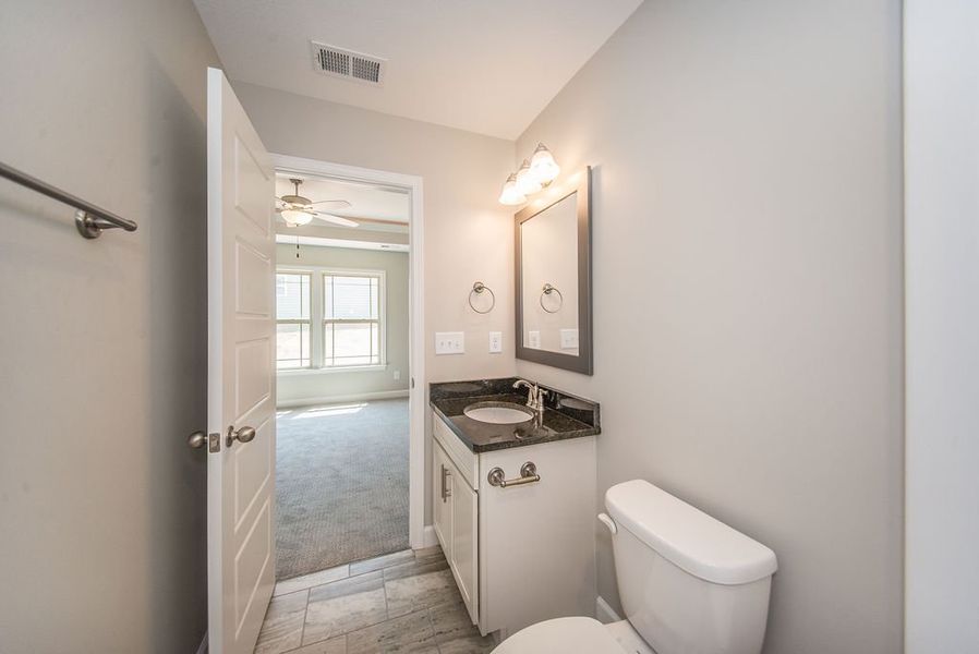 Representative furnished interior of a home built from the Pacific by Enchanted Homes in Hampshire Heights, Moore (Image 30).