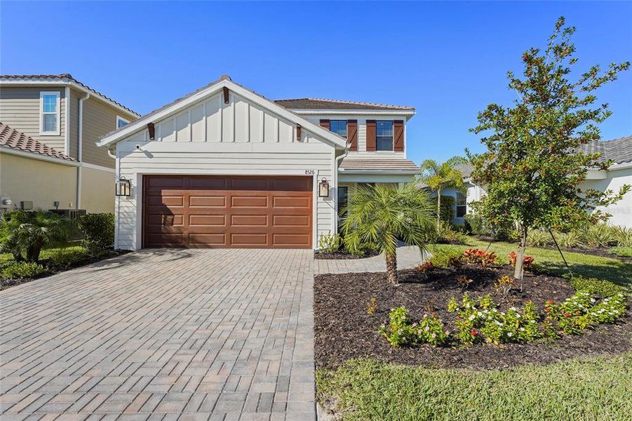 Front exterior of a new home in , Sarasota, FL, highlighting curb appeal (Image 30).