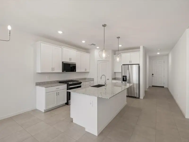 Furnished interior view inside a new home in Silva Farms - Estate Series, Goodyear (Image 2).