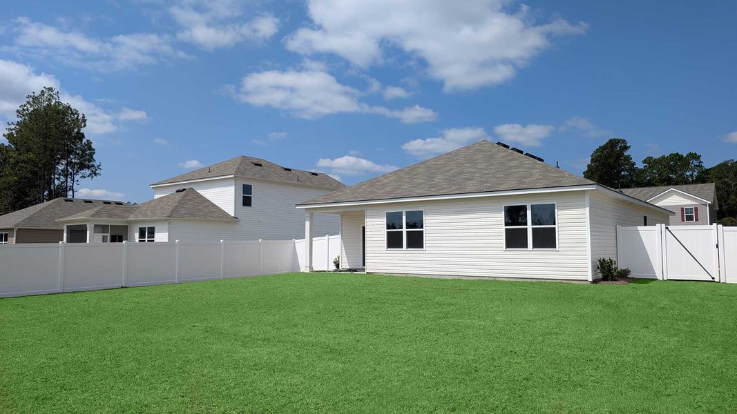 Front exterior of a new home in Preserve at Cypress Commons, Conway, SC, highlighting curb appeal (Image 2). Front exterior of a new home in Preserve at Cypress Commons, Conway, SC, highlighting curb appeal (Image 2).