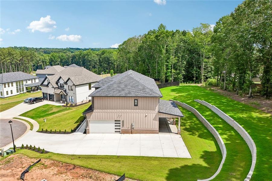 Front exterior of a new home in , Auburn, GA, highlighting curb appeal (Image 34). Front exterior of a new home in , Auburn, GA, highlighting curb appeal (Image 34).