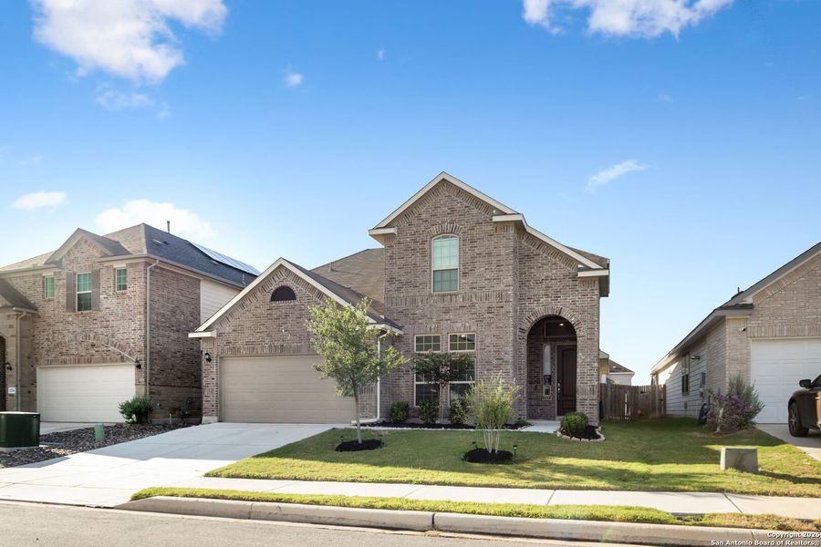 Front exterior of a new home in Rhine Valley, Schertz, TX, highlighting curb appeal (Image 31).