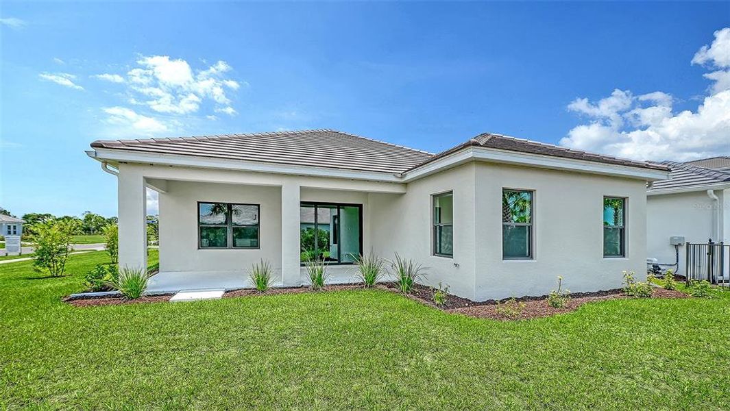 Exterior details and patio area of a home in Grand Park, Sarasota (Image 22). Exterior details and patio area of a home in Grand Park, Sarasota (Image 22).