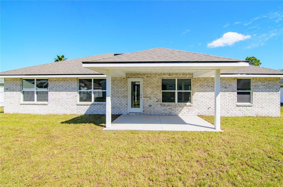 Exterior details and patio area of a home in Palm Coast, Palm Coast (Image 17). Exterior details and patio area of a home in Palm Coast, Palm Coast (Image 17).