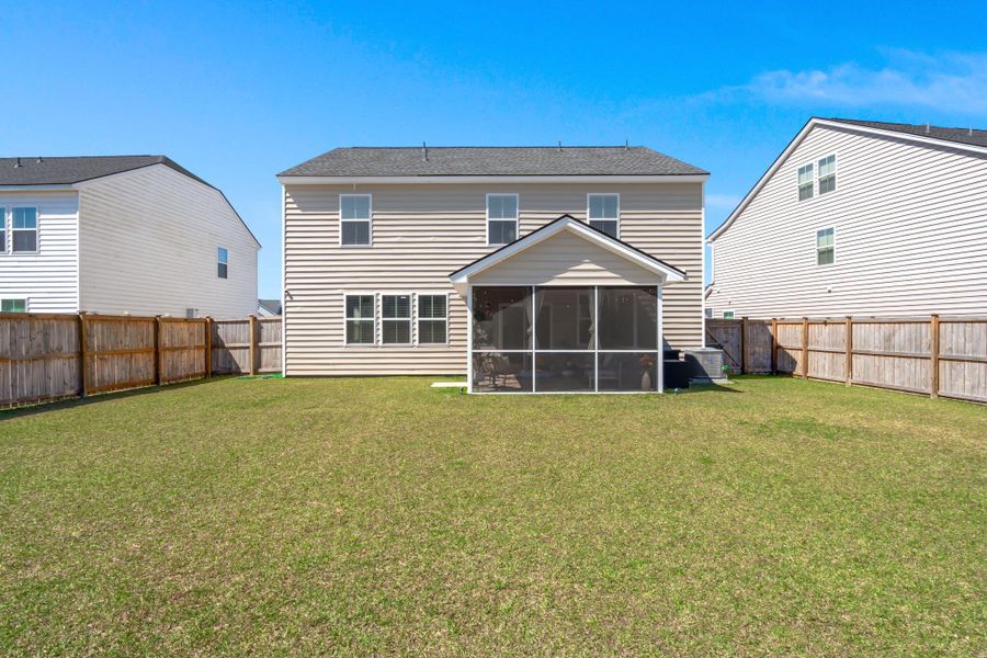 Exterior details and patio area of a home in Lindera Preserve at Cane Bay Plantation, Summerville (Image 20).