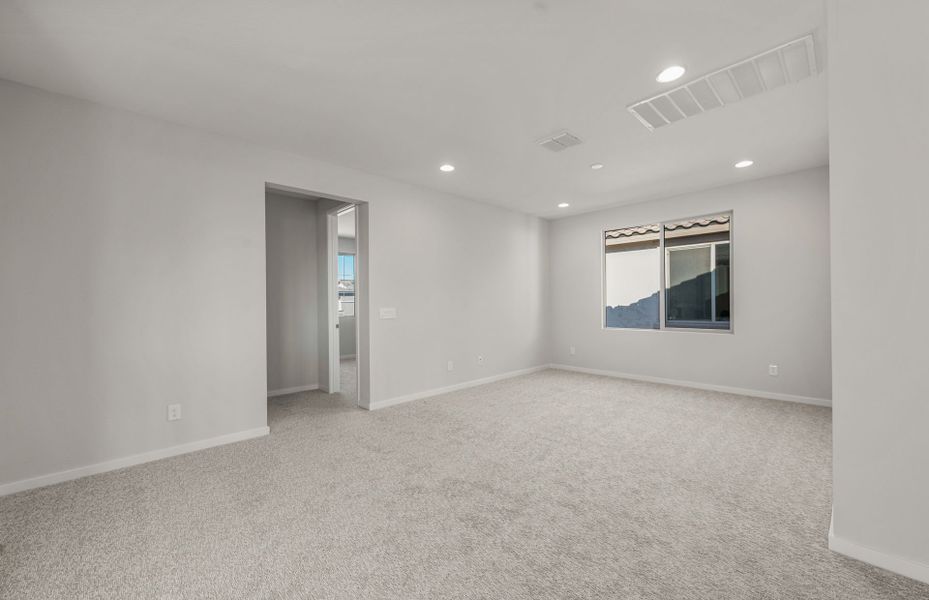 Spacious, unfurnished interior of a new home in Legado West, Queen Creek (Image 19).