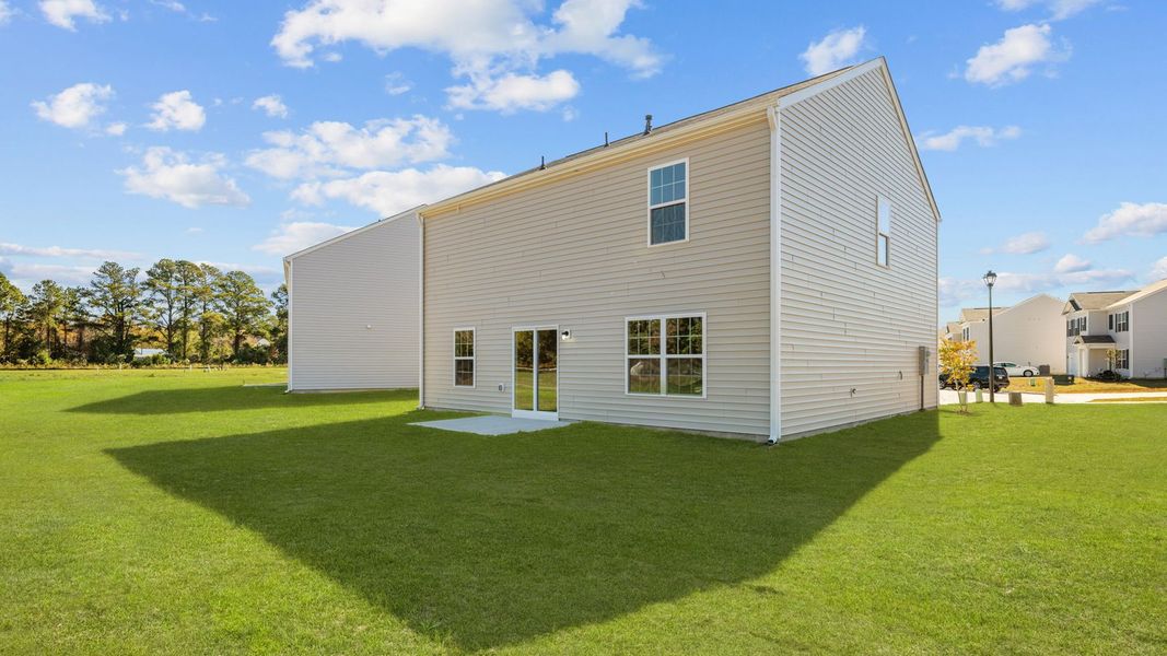Exterior details and patio area of a home in Madeline Farm, New Bern (Image 18).