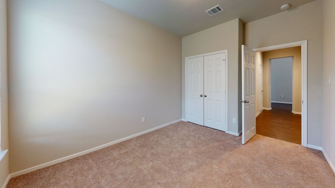 Representative unfurnished interior of a home built from the Floor Plan 3256 by Colina Homes in Grand Magnolia, Magnolia (Image 64).