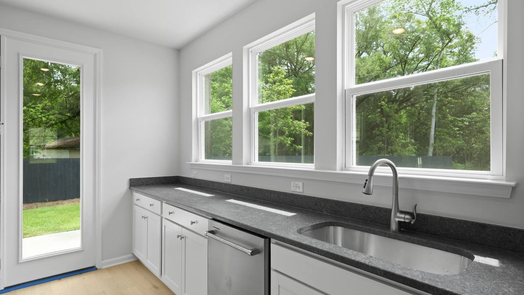 Representative furnished interior of a home built from the FORRESTER by D.R. Horton in Founders Corner, Summerville (Image 5).