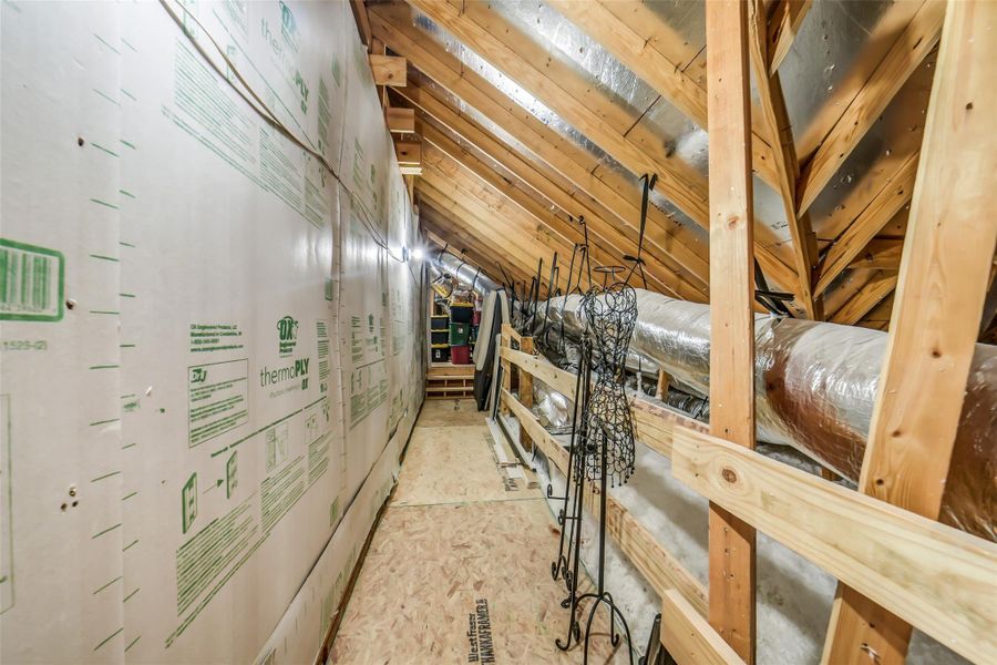 Upstairs walk-in attic space, walkway leads to a large area with plenty of storage space Upstairs walk-in attic space, walkway leads to a large area with plenty of storage space