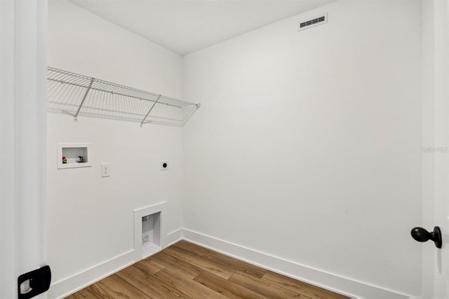 Spacious, unfurnished interior of a new home in Parkview at Hamlin, Winter Garden (Image 28).