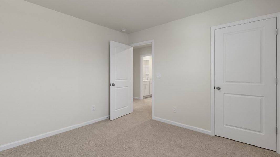 Spacious, unfurnished interior of a new home in The Grove at Matthews Landing, Fuquay Varina (Image 24).