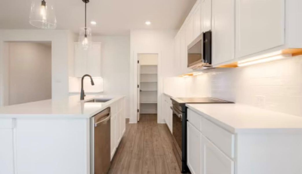 Furnished interior view inside a new home in , Kyle (Image 4). Furnished interior view inside a new home in , Kyle (Image 4).