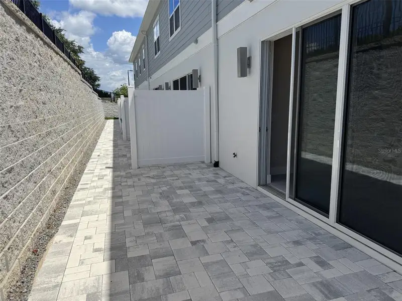 Exterior details and patio area of a home in , Kissimmee (Image 3).