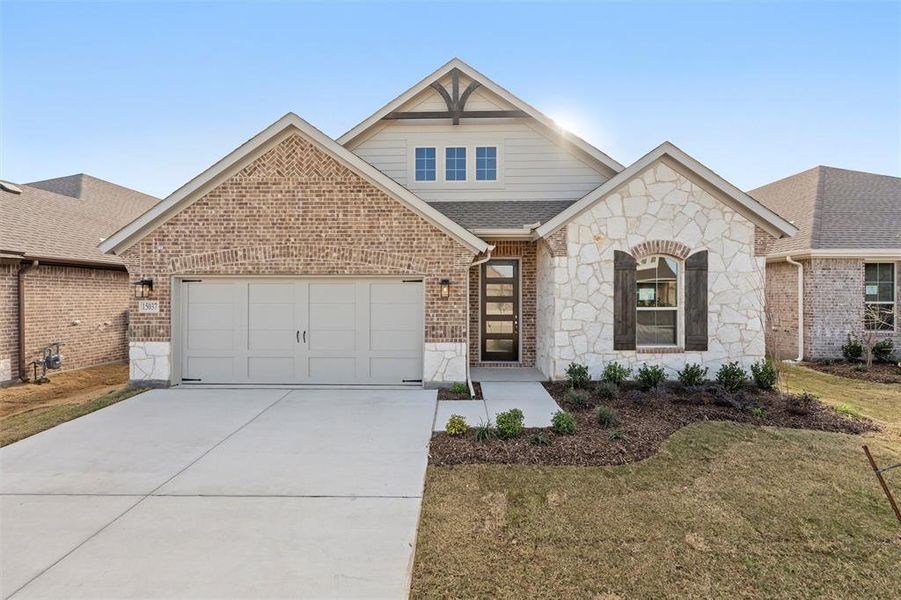 Front exterior of a new home in Morningstar, Aledo, TX, highlighting curb appeal (Image 2).