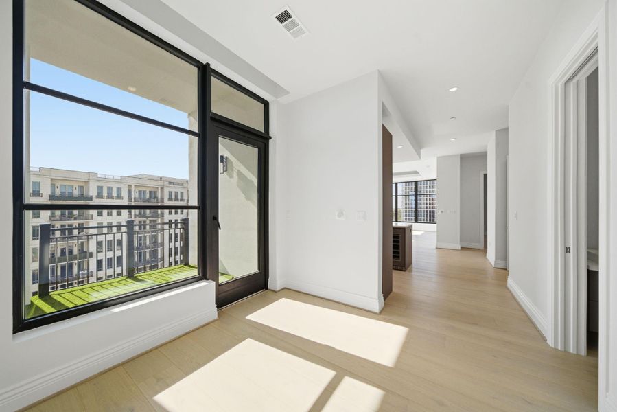 Foyer off private elevator combines modern design & with classic luxury. The hallway seamlessly transitions into the heart of the home. Foyer off private elevator combines modern design & with classic luxury. The hallway seamlessly transitions into the heart of the home.