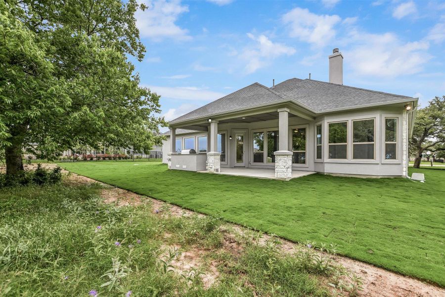 Exterior details and patio area of a home in Leander Estates, Leander (Image 4).