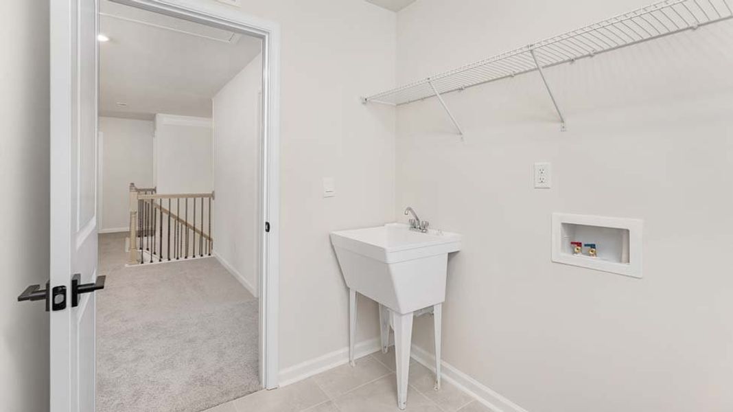 Furnished interior view inside a new home in Sylvan Creek, Denver (Image 28).