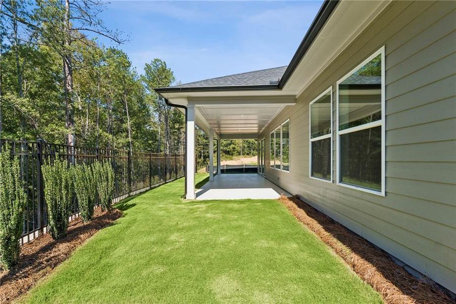 Exterior details and patio area of a home in Old Mill Preserve, Dallas (Image 2).