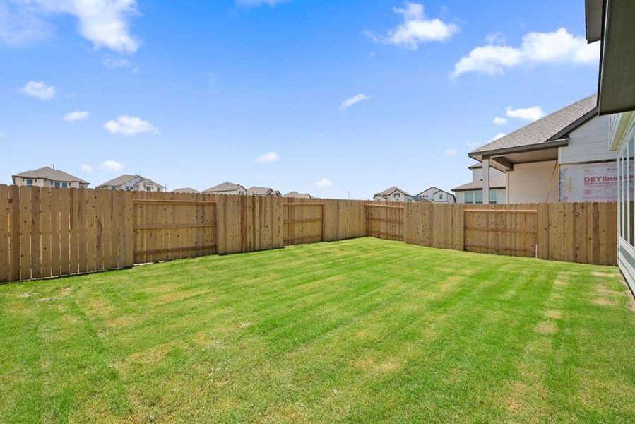 Exterior details and patio area of a home in Lariat, Liberty Hill (Image 3). Exterior details and patio area of a home in Lariat, Liberty Hill (Image 3).