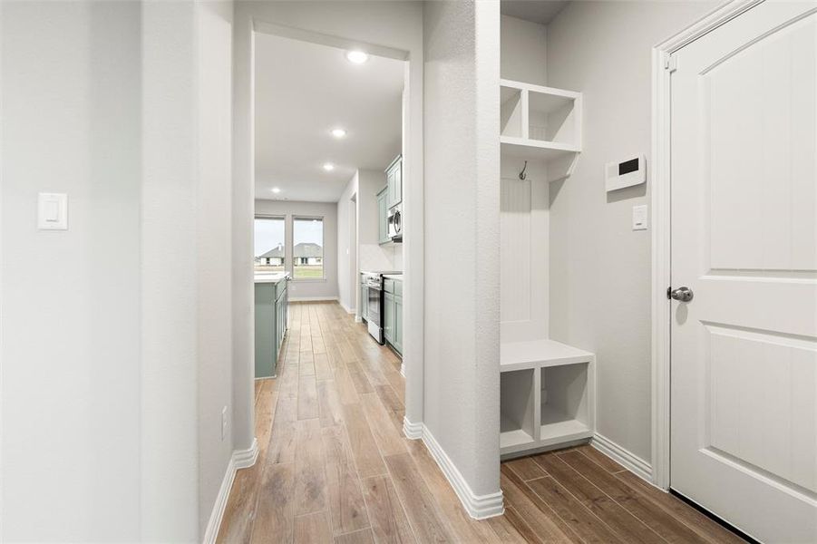 Mudroom with wood finish floors and recessed lighting Mudroom with wood finish floors and recessed lighting