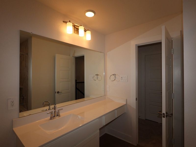 Furnished interior view inside a new home in Sorella, Tomball (Image 12).