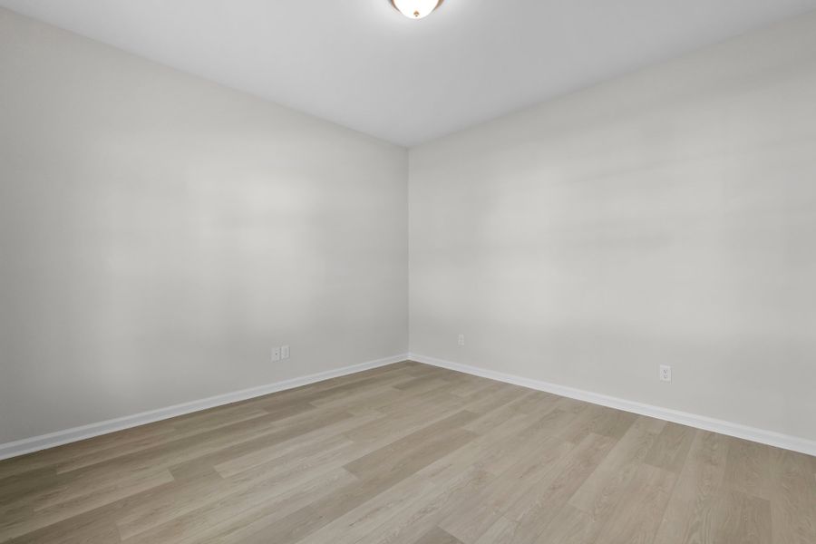 Representative unfurnished interior of a home built from the The Magnolia by Smith Family Homes in Lakeview Pines, Statesboro (Image 25).