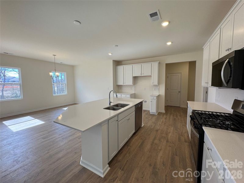 Furnished interior view inside a new home in McFarland Estates, York (Image 5).