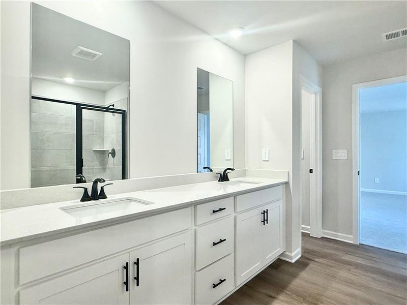 Furnished interior view inside a new home in Vines at Mill Creek - Estate Series, Braselton (Image 11). Furnished interior view inside a new home in Vines at Mill Creek - Estate Series, Braselton (Image 11).