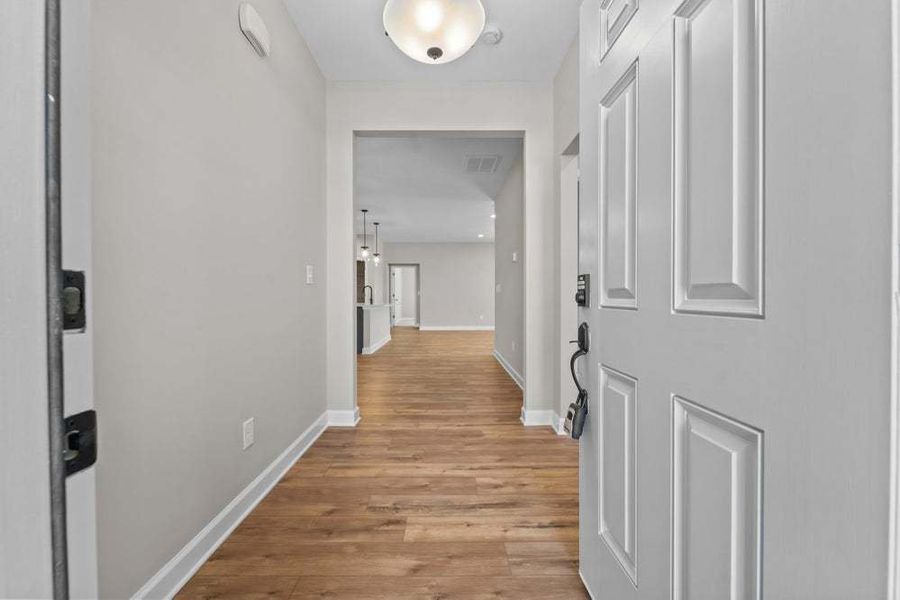 Representative unfurnished interior of a home built from the Weymouth by Caviness & Cates Communities in Bartlett Manor, Youngsville (Image 36).